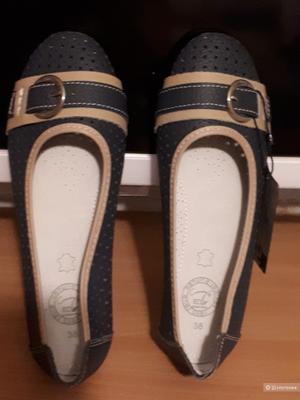 Удобные новые балетки из натуральной перфорированной кожи 38евро на 37 русский размер